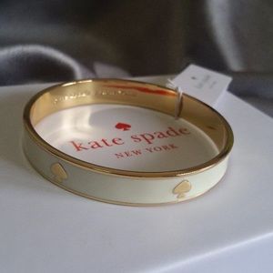 Kate Spade white and gold bangle
